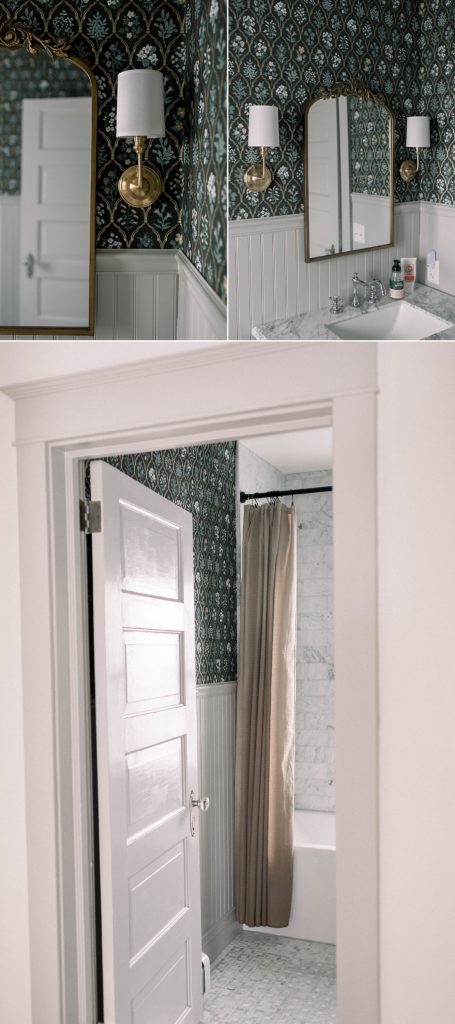 This dark marble bathroom is a stark contrast from what it was before – cramped and in need of work. The Rifle Paper Co Hawthorne wallpaper contrasts perfectly with all of the marble tile from The Tile Shop. The sconces from Signature Hardware, the antique brass mirror from Kate & Laurel, and the Farrow and Ball Purbeck Stone painted beadboard tie the whole space together.